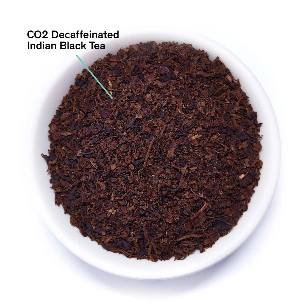 Essentials Decaf Black tea packaging with description of organic decaf black tea from South India
