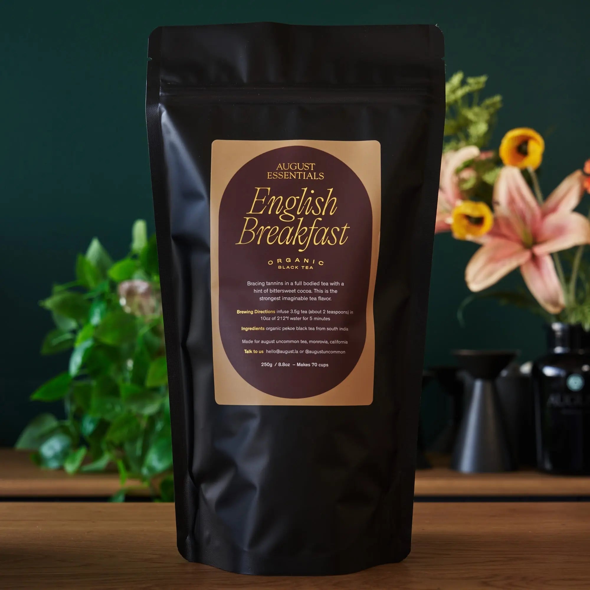 Essentials English Breakfast organic black tea packaging with tea bags and cocoa flavor description