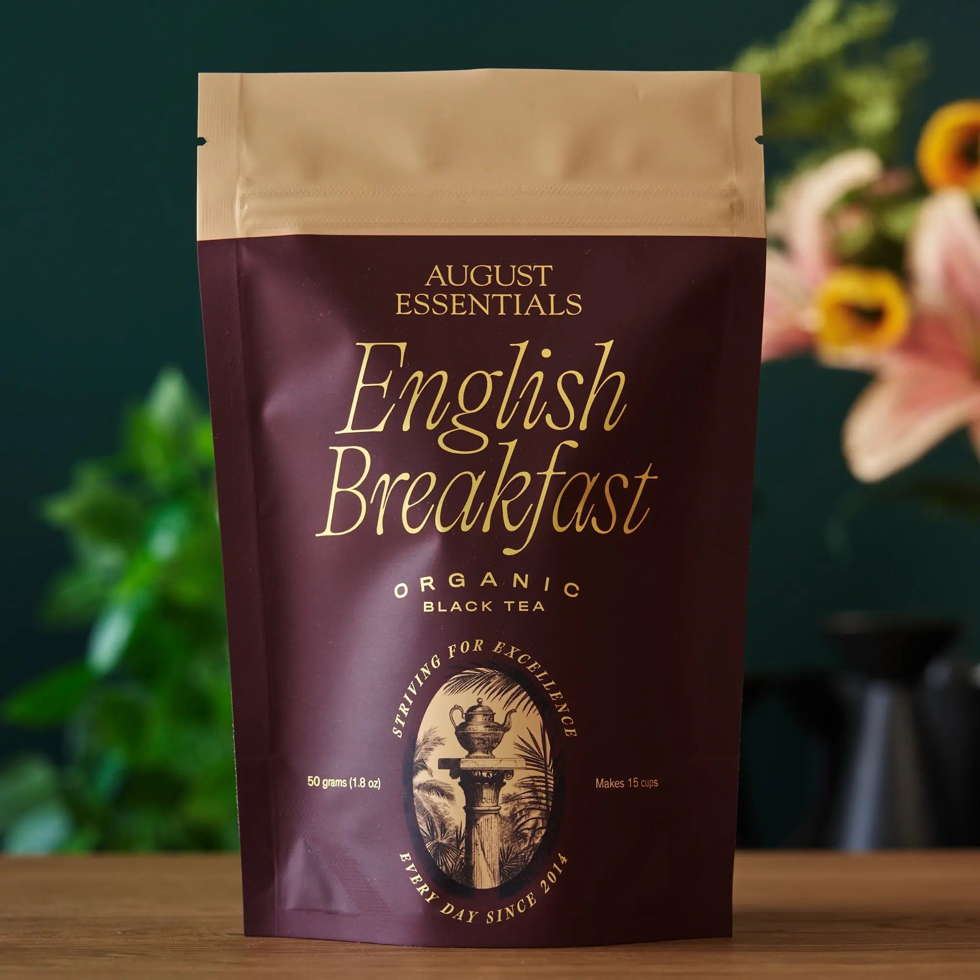 Essentials English Breakfast black tea packaging with organic South Indian tea bags and description of strong full-bodied flavor with bittersweet cocoa notes