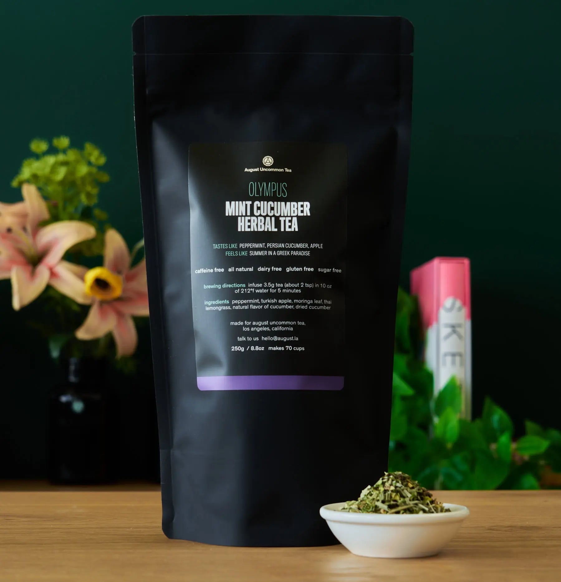 Olympus Mint Cucumber Herbal Tea cup with cucumber slices and peppermint leaves, caffeine-free and natural