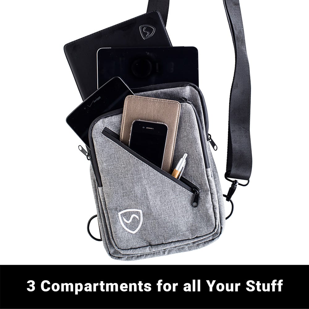 SYB Sling Bag made with SaferBody shields from 99% EMF radiation, features three compartments, adjustable strap, and carries devices up to 10x7 inches.