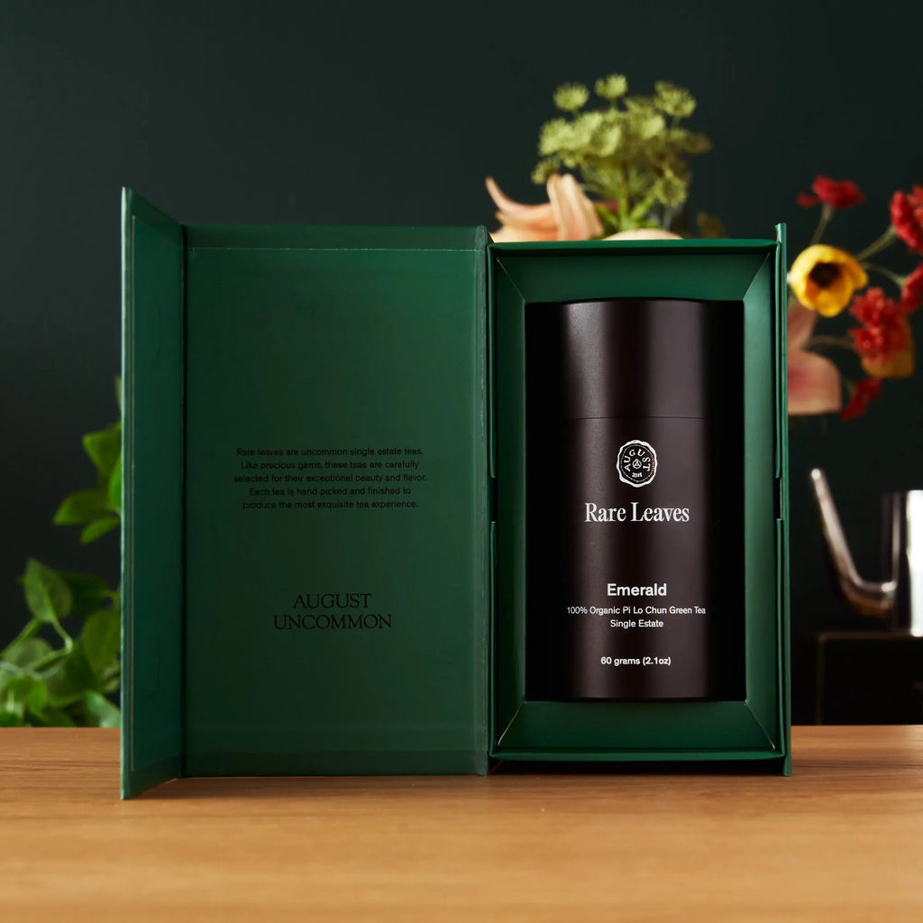 Luxury gift set of Rare Leaves teas in aluminum tins including Gold, Black Pearl, and Emerald varieties