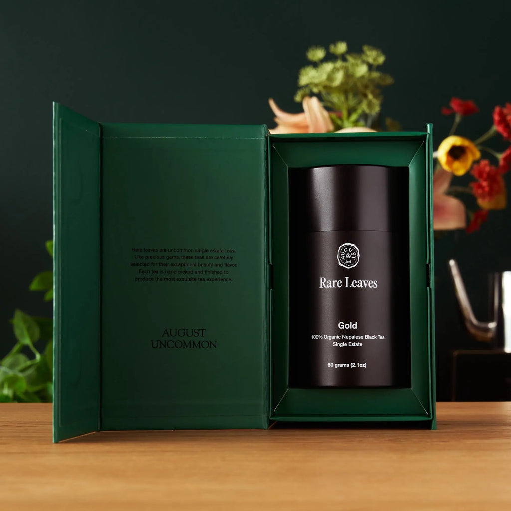 Rare Leaves Gold single estate Nepalese black tea tin with tea leaves and flavor notes of roasted barley, clover, and honey