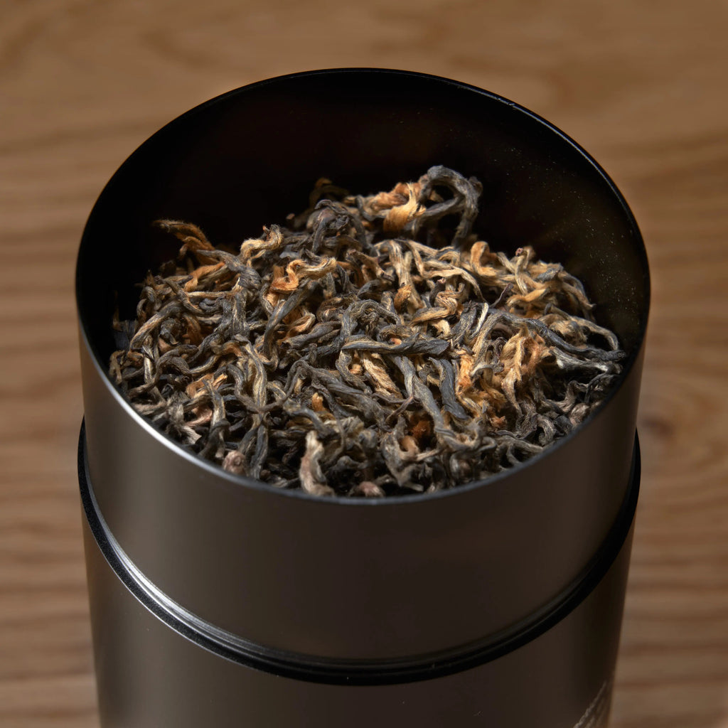 Rare Leaves Gold Nepalese black tea with roasted barley, clover, honey notes in airtight aluminum tin