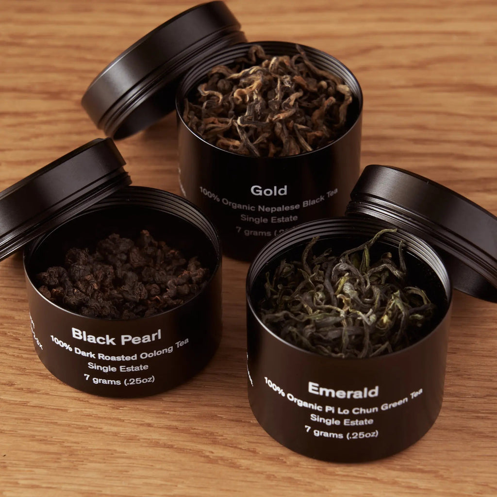Rare Leaves Teas mini tin sampler featuring Emerald green tea, Black Pearl oolong, and Gold Nepalese black tea in airtight aluminum tins